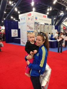 A and me at the expo... mother of the year who doesn't put shoes on her child in January in Texas :)