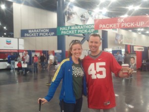 With my bro and A at the expo... stupid lady taking the picture cut A out of it (notice the stroller handles I'm touching)... who cuts a baby out of a picture!?!