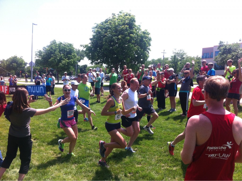 Meredith (purple, left, side-five). Girl's got spirit when it comes to runnin'. Love it.