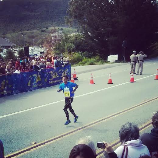 Anil on his way to a 50+ minute -- read that slowly -- PR. Nothing like smiling at mile 25.5.