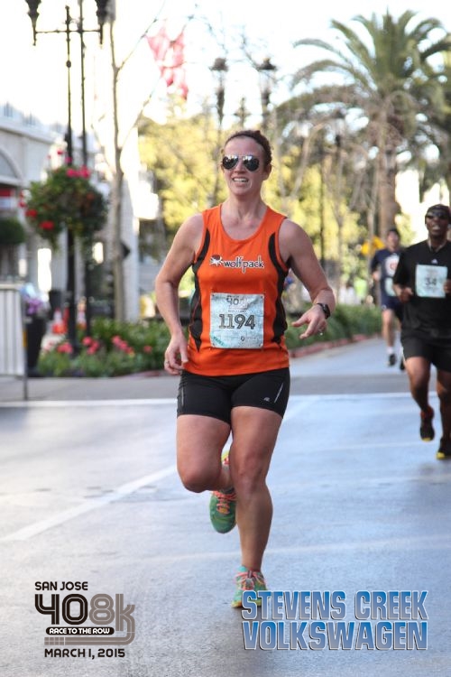 free race pics ftw! also, one day I'll learn that smiling mid-run just makes it look like I'm in pain. and: this shows why it is impossible for me to find super running shorts; I'm thigh gap antithesis. see also: quads for daaaaaaayz