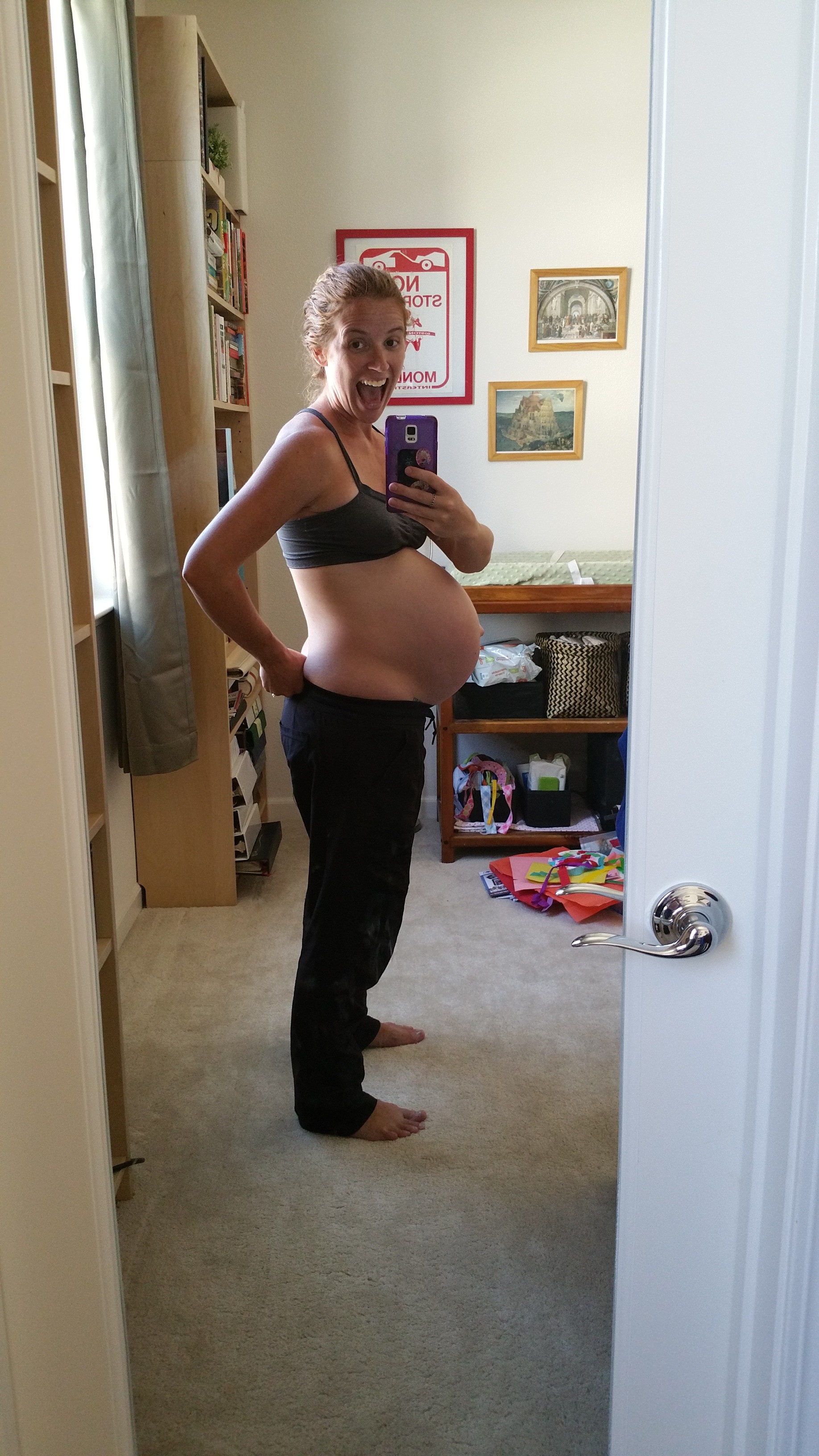 thank god I gave birth about 12 hours later. this was my last pic I sent to my also-pregnant-at-the-time sister, basically saying that I had no idea where else this baby was going to grow because I was plum outta room. 