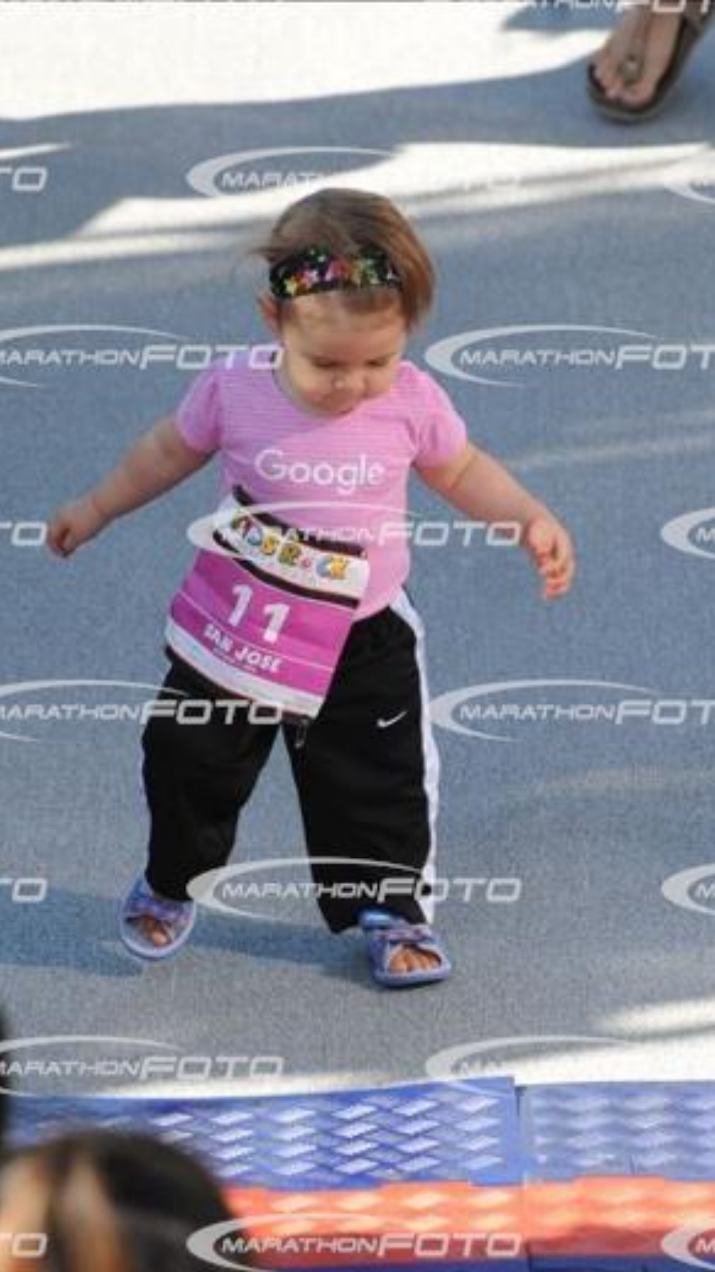 I think she was the only walker in her "diaper dash" heat :) (and yes, marathonfoto thinks you'll pay for pics of your kid walking about 5 feet...)