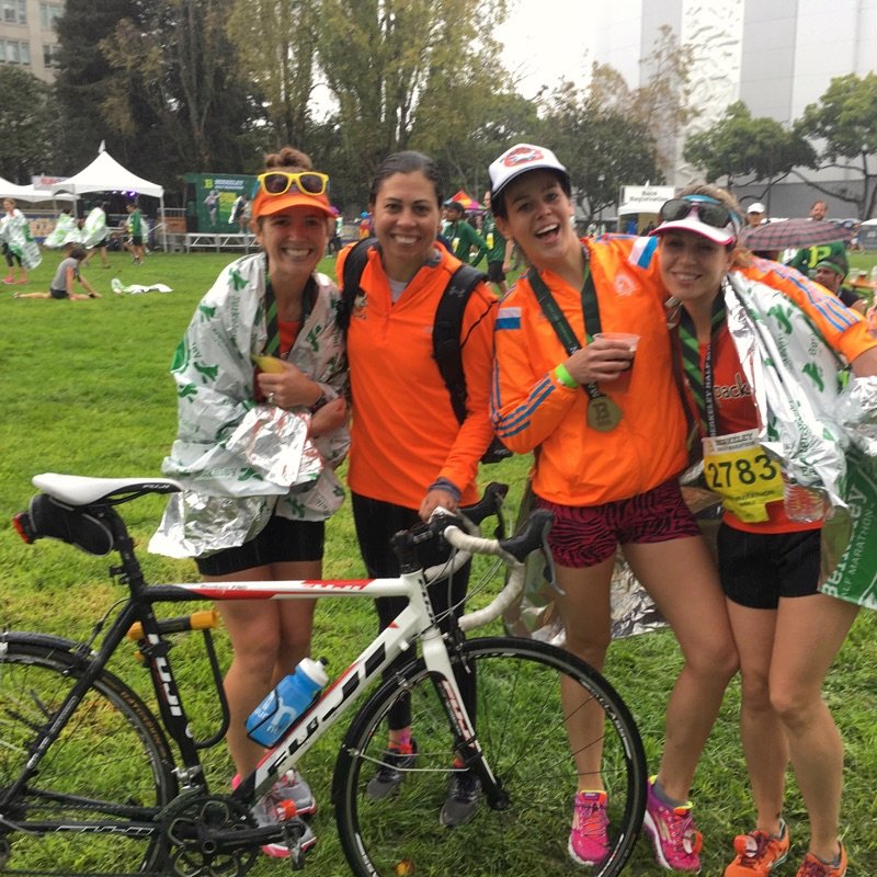 shivering in the rain with Coach Lisa, KB, and Meg. I ran back to Meredith's wearing that mylar blanket tied around my waist. (PC: Meredith)